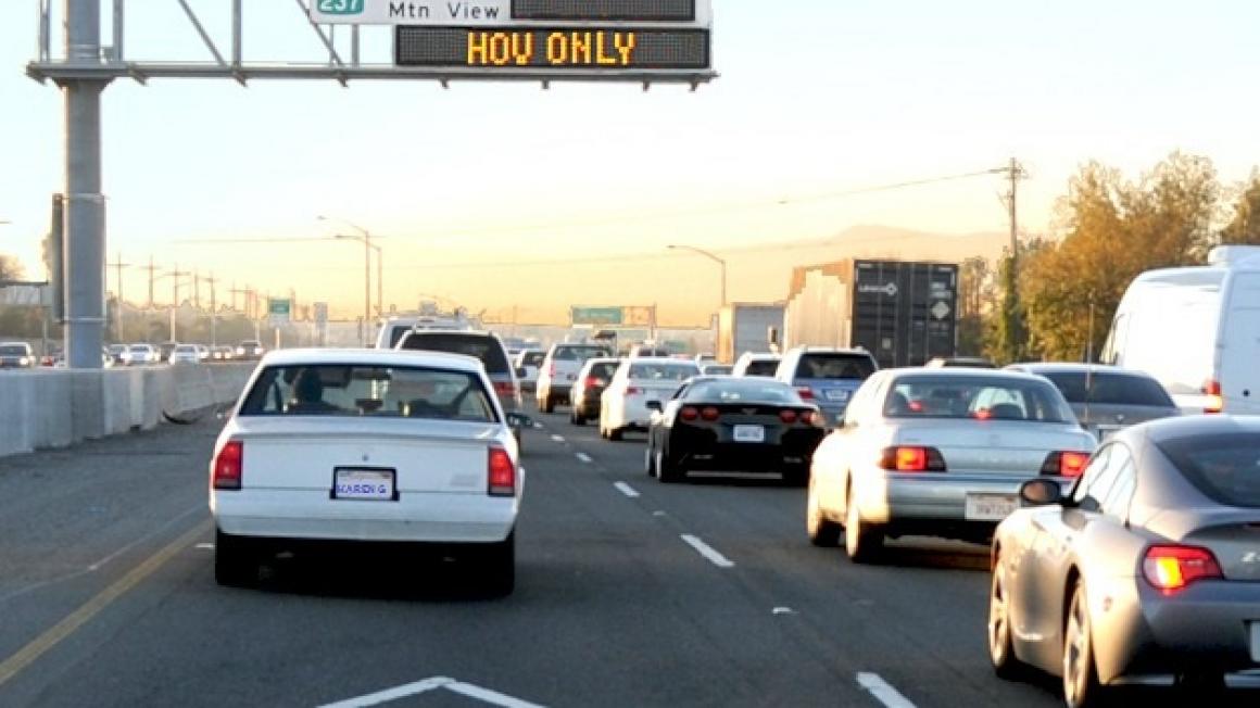 cars in express lane with Express Lane sign