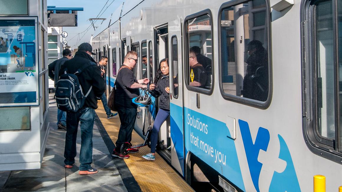 people boarding train