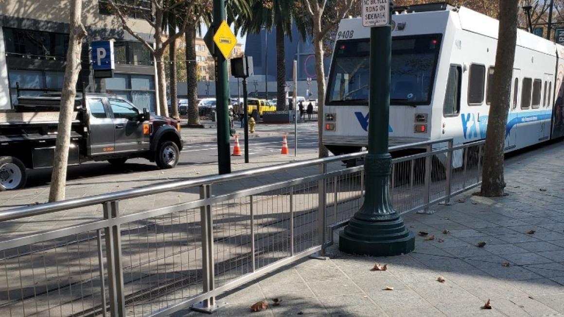 railing along light rail track