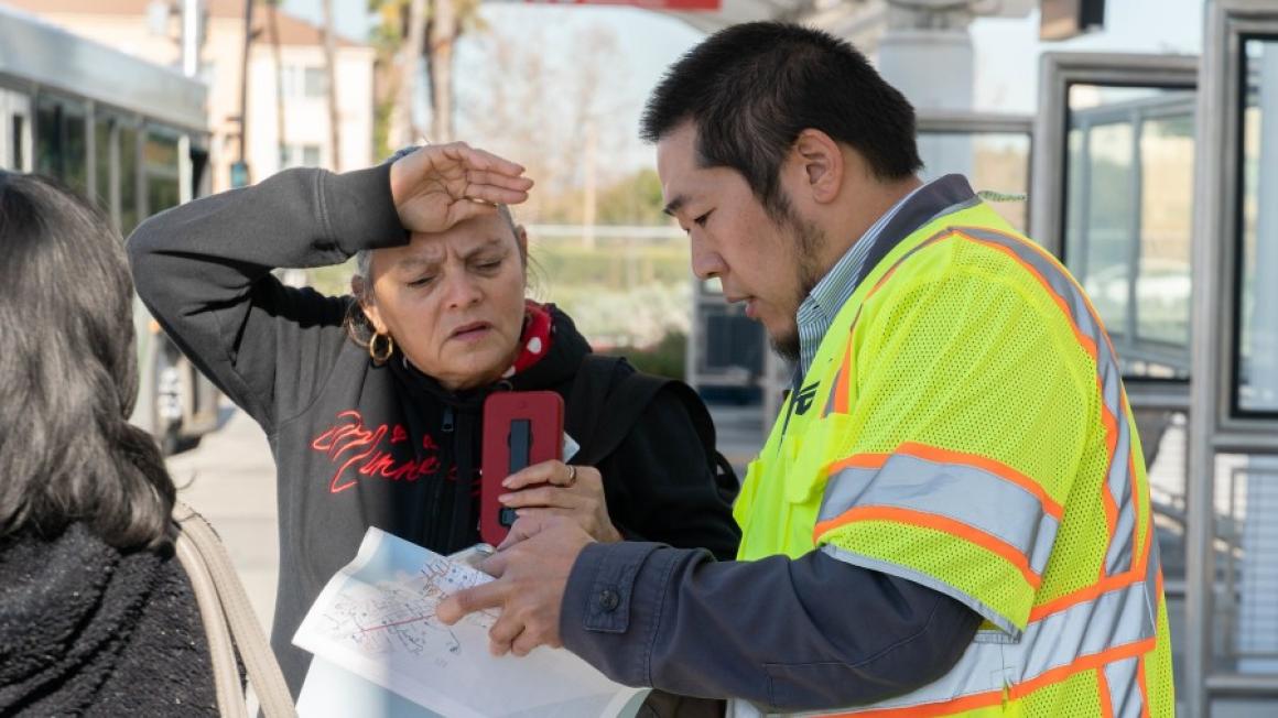 VTA Street Team member helping a customer