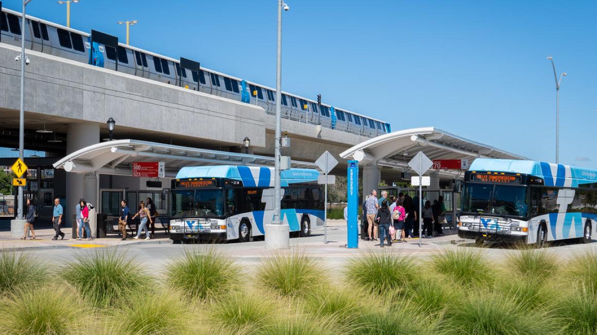 VTA Buses wait at stop alongside BART Station