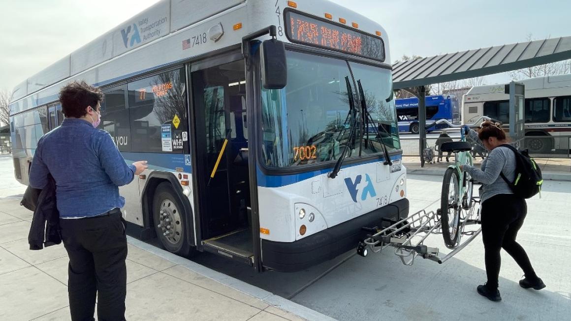 bus passenger and bicyclist