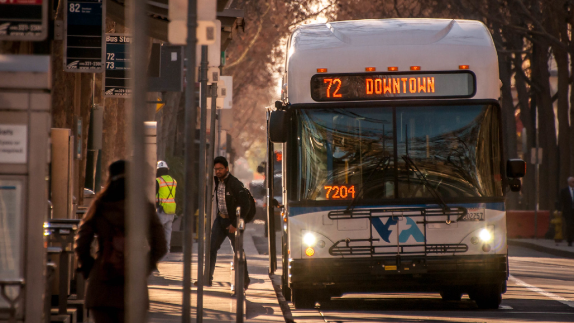 Downtown VTA bus with rider exiting