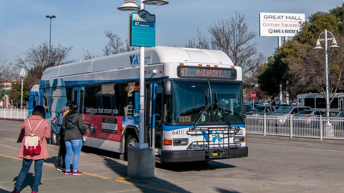 VTA bus with people walking toward it