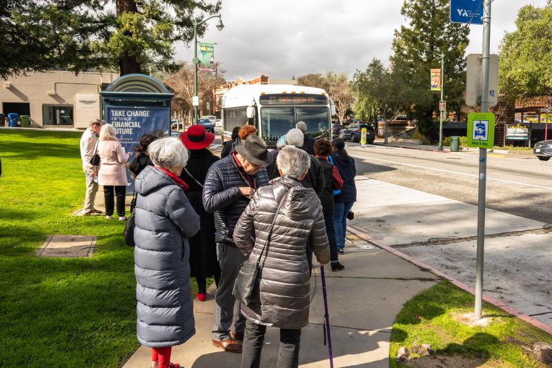Passengers Boarding a Bus