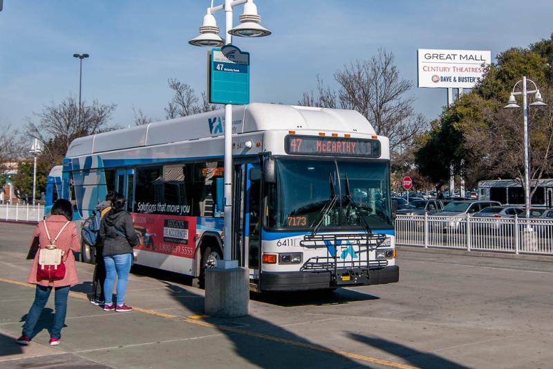 VTA bus with people walking toward it