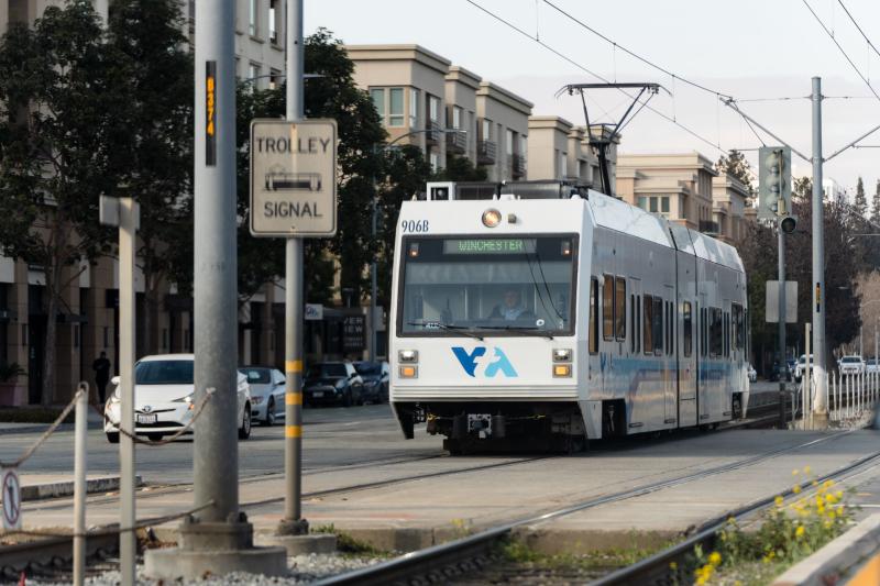 VTA light rail driving through a trolley crossing