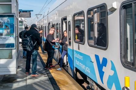 people boarding train