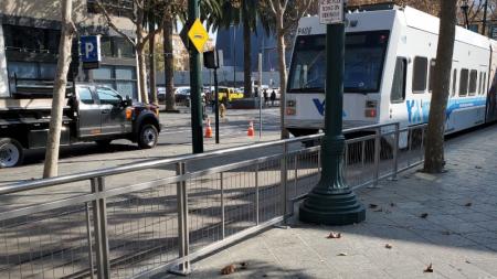 railing along light rail track