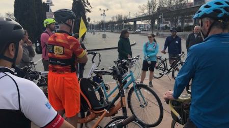 Bike riders gather to talk along the Tasman corridor