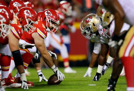 49ers and Kansas City players on field