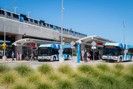 VTA Buses wait at stop alongside BART Station