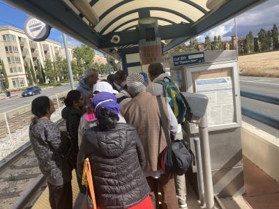 people at vta light rail station