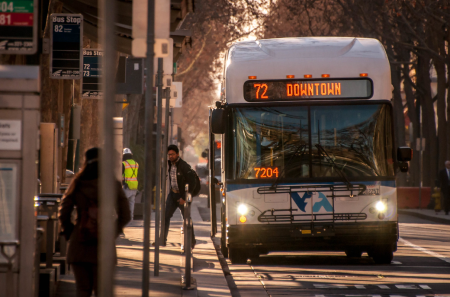 Downtown VTA bus with rider exiting