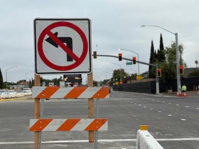 no left turn sign on street