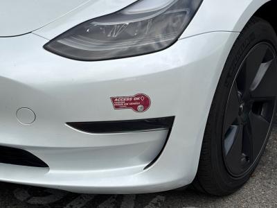 closeup of car with Access OK tag