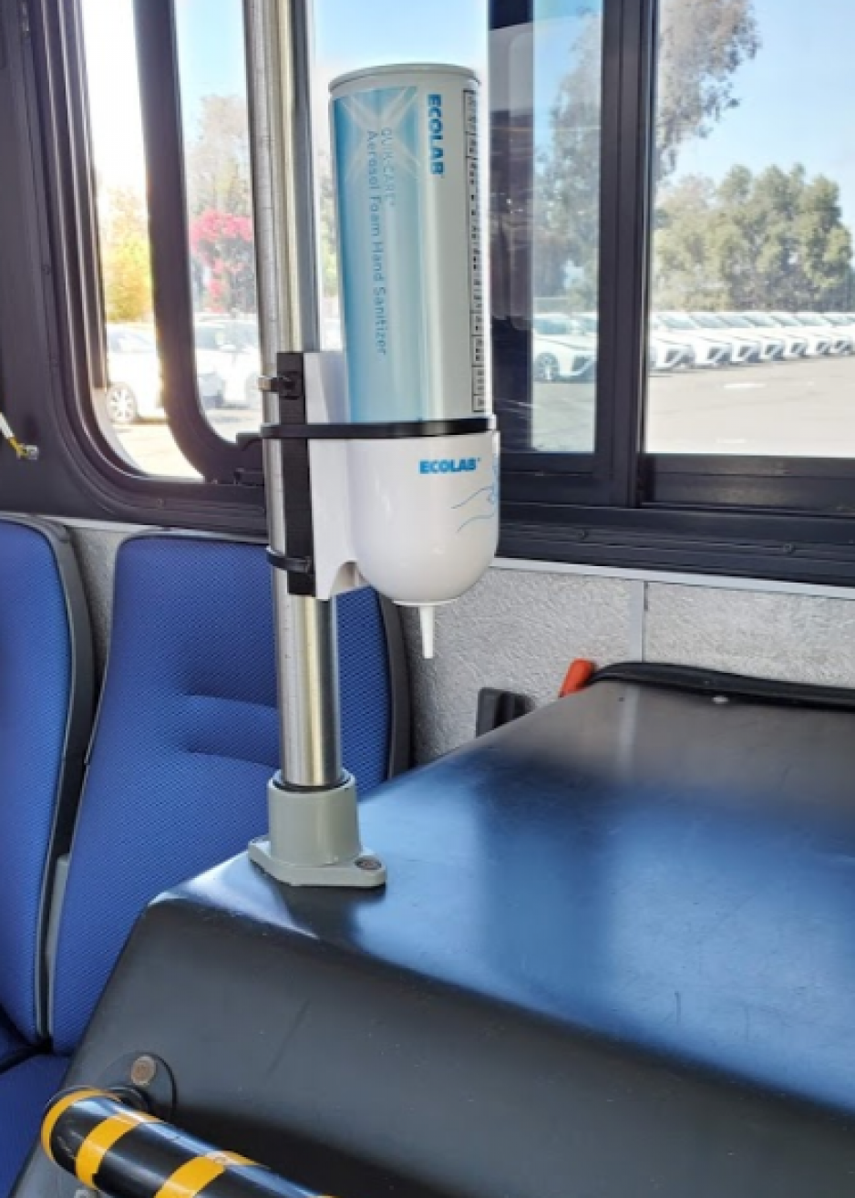 hand sanitizer dispenser on bus