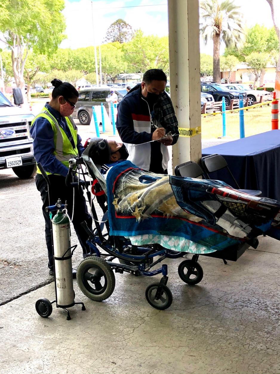 Paratransit client is checked into COVID vaccine clinic