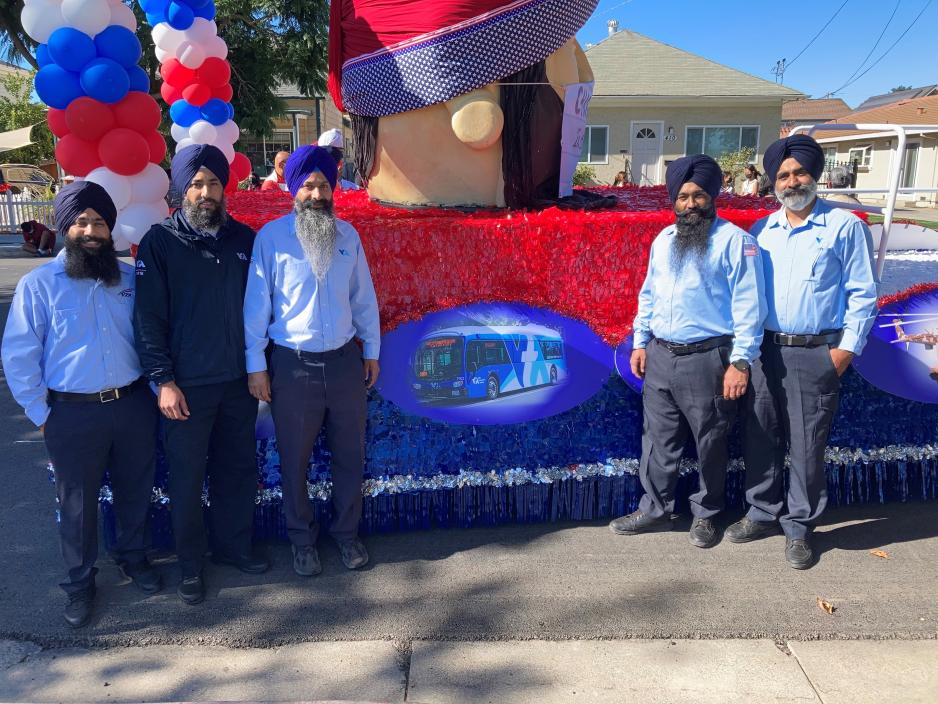 VTA Operators post in front of Sikh Float