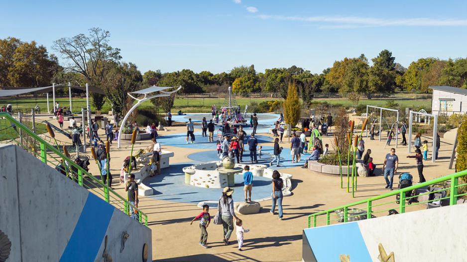 A photo of children playing at a playground.