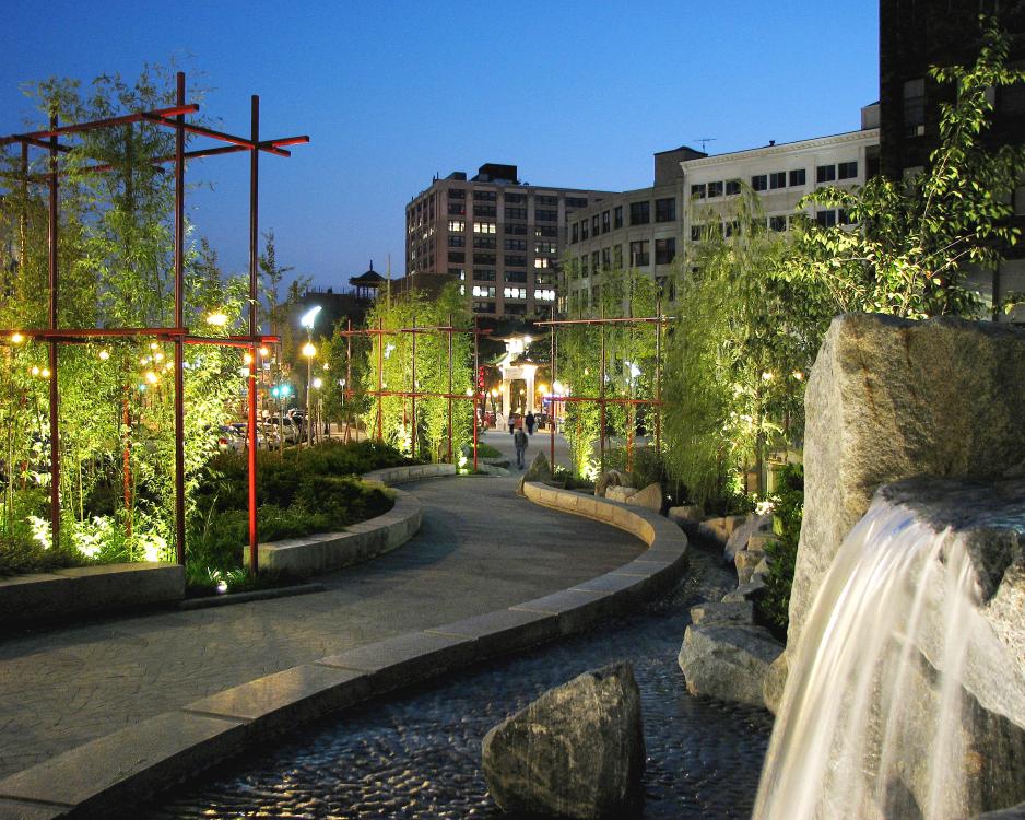 A photo of a park with a walking trail.