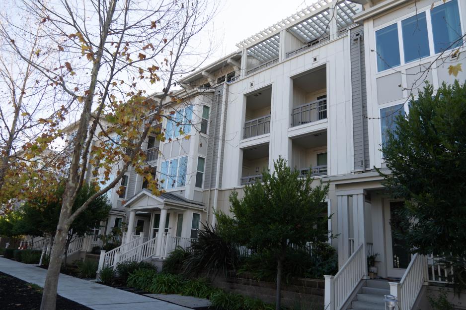 A photo of a row of townhouses.