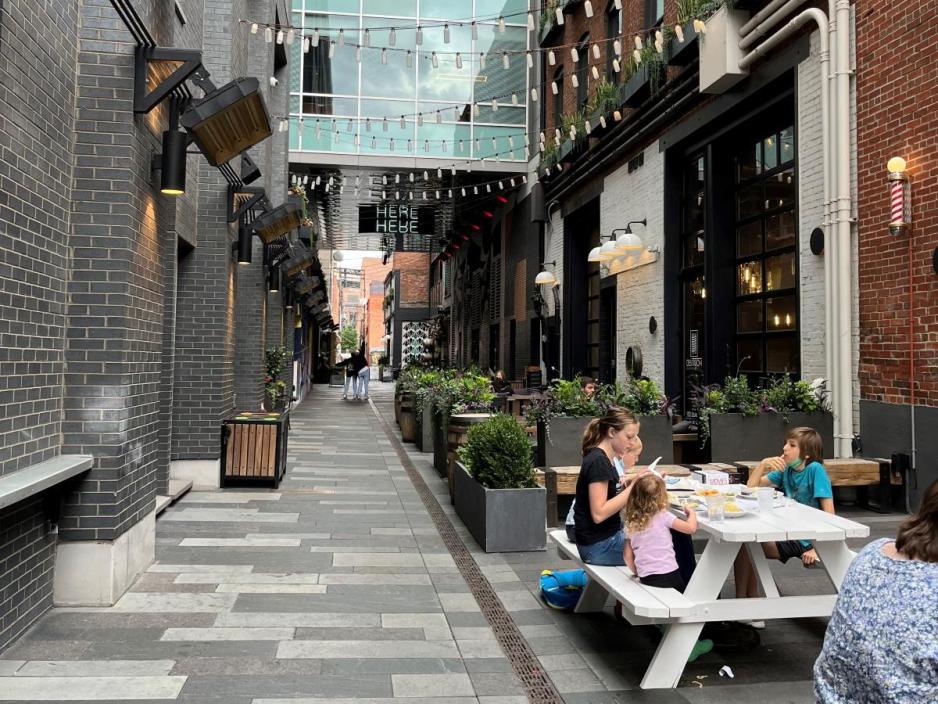 People sitting at a table outside