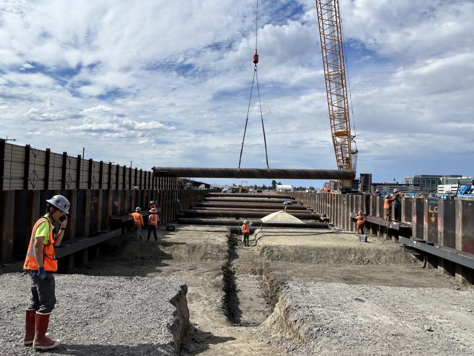 construction worker and bulldozer in launch structure