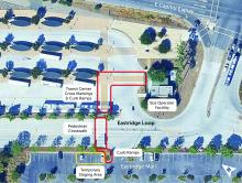 An aerial overview of the Eastridge Transit Center Crosswalk Project, outlining the location of the pedestrian crosswalk and the Transit Center crosswalk markings. The image also shows approximately six parking spots that will serve as the temporary construction staging area.